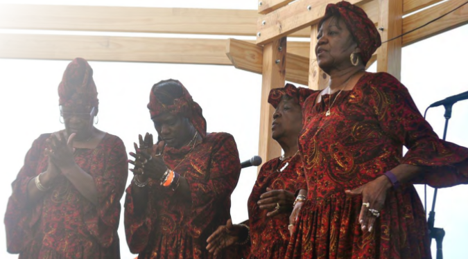 Gullah-Geechee women perform on stage
